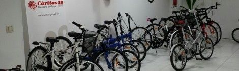 Cáritas Diocesana de Girona y PedalsBike firman un convenio de colaboración para la venta de bicicletas solidarias de Ecosol